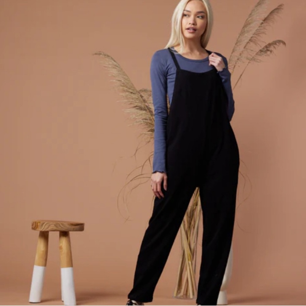 Known Supply Cadence Overall in Black size Large